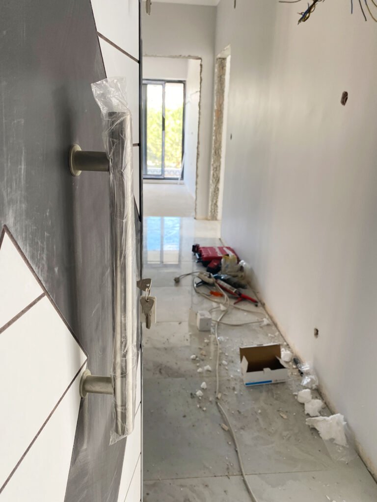 renovation scene viewed through open door renovation scene viewed through open door